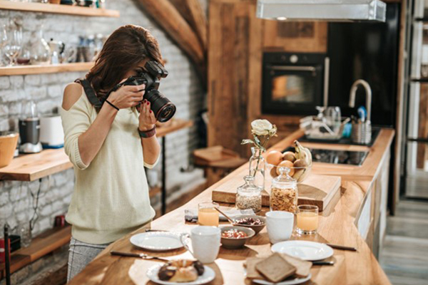 A freelance photographer during a menu shoot.