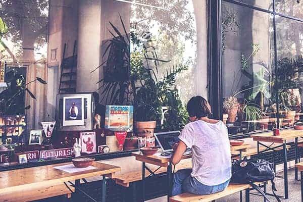 freelancer working in a cafe