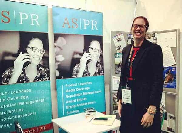 PR Freelancer Andrea Sexton stood in front of her own stall while exhibiting at BETA International, held at the NEC.