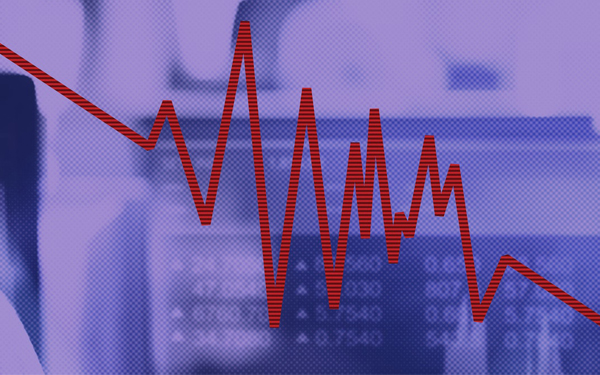 Graph showing financial impact with sales report figures on a laptop in the background