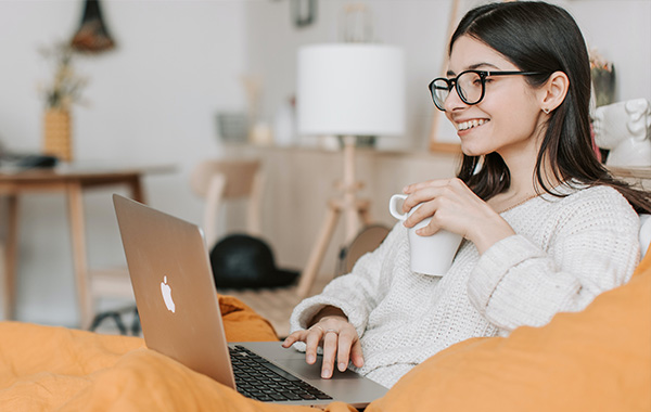 Woman happily working from home