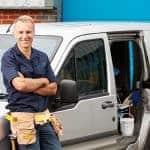 tradesman with his work van