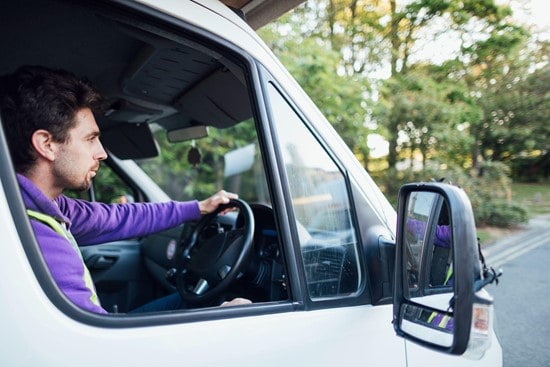 A tradesperson driving a van for work purposes